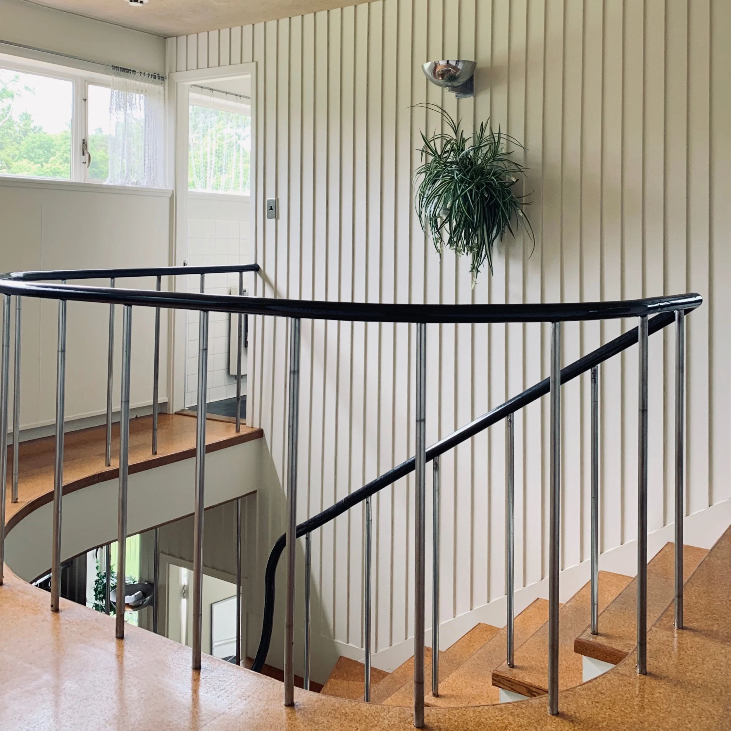 The stair and public floors are clad in Cork Tiles. The stair case design and balustrade rails are slightly curved to reflect the New England vernacular.