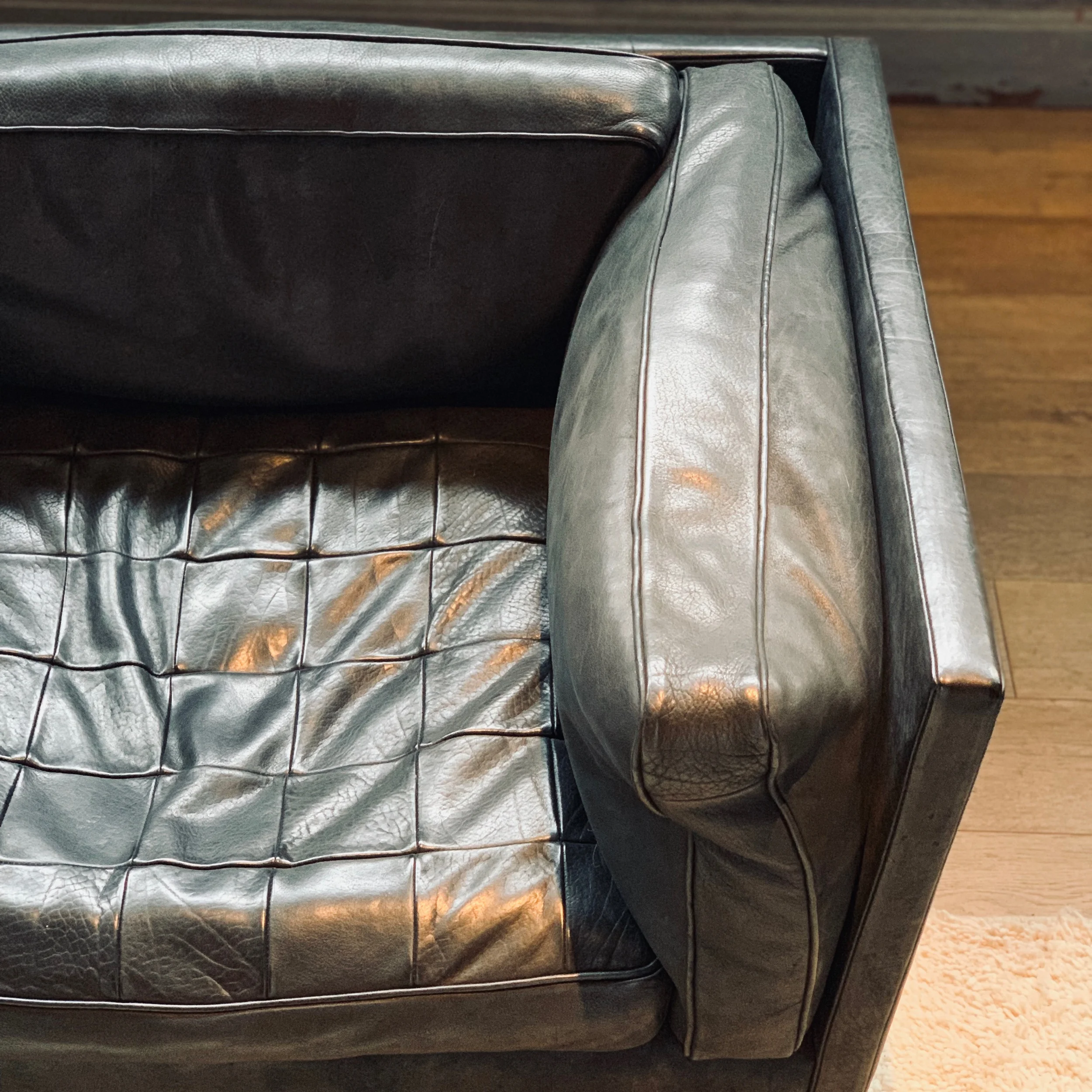 A sofa designed by RW Guild- also in the couple’s Montauk home.