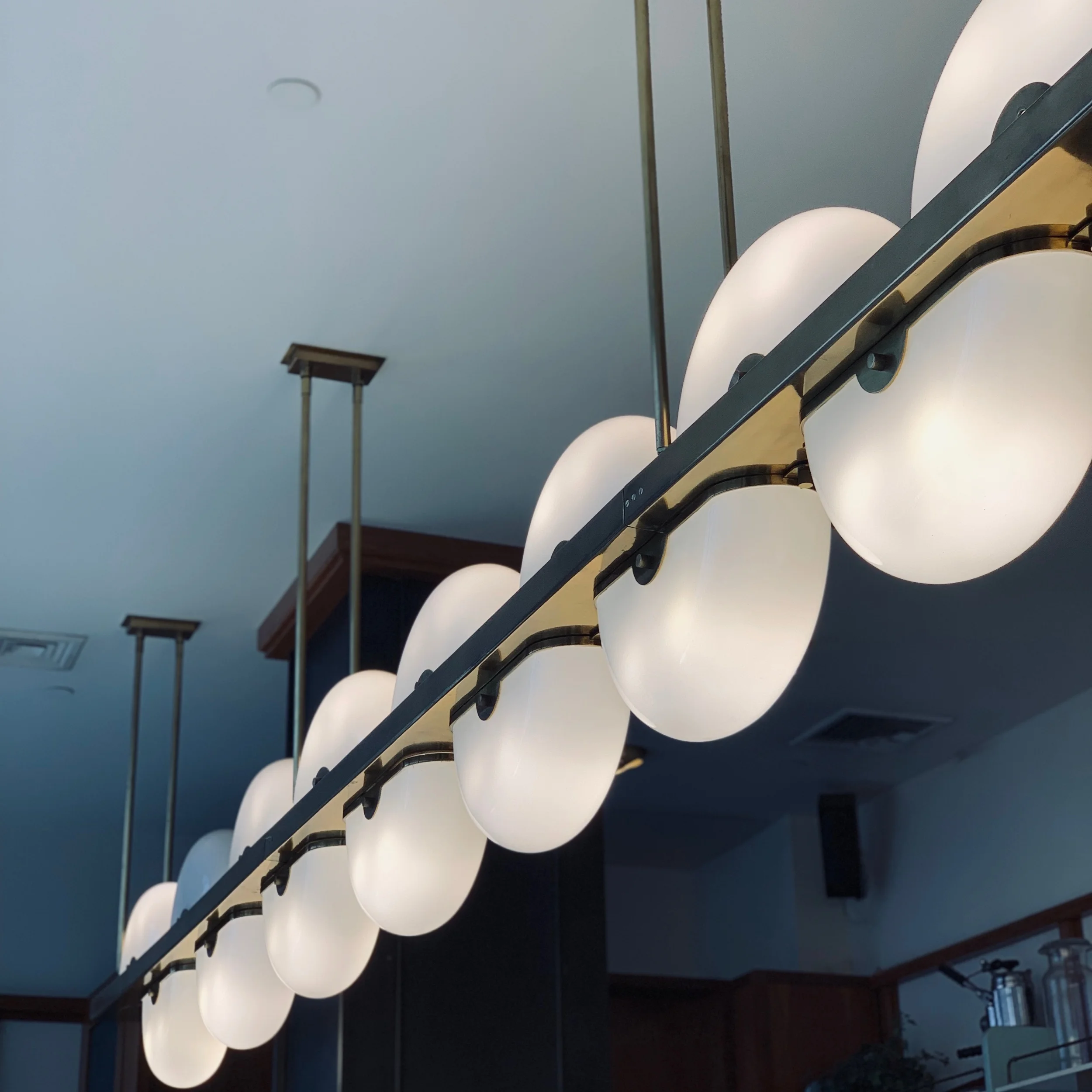 Bespoke lighting outside the coffee shop at the Ace Hotel NYC by Roman and WIlliams