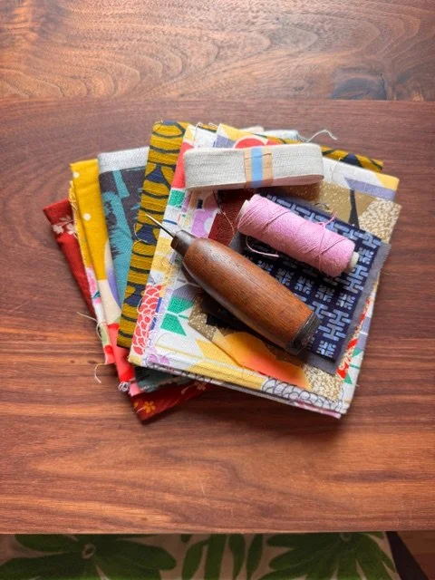 Book Binding cloth scraps with awl.jpeg