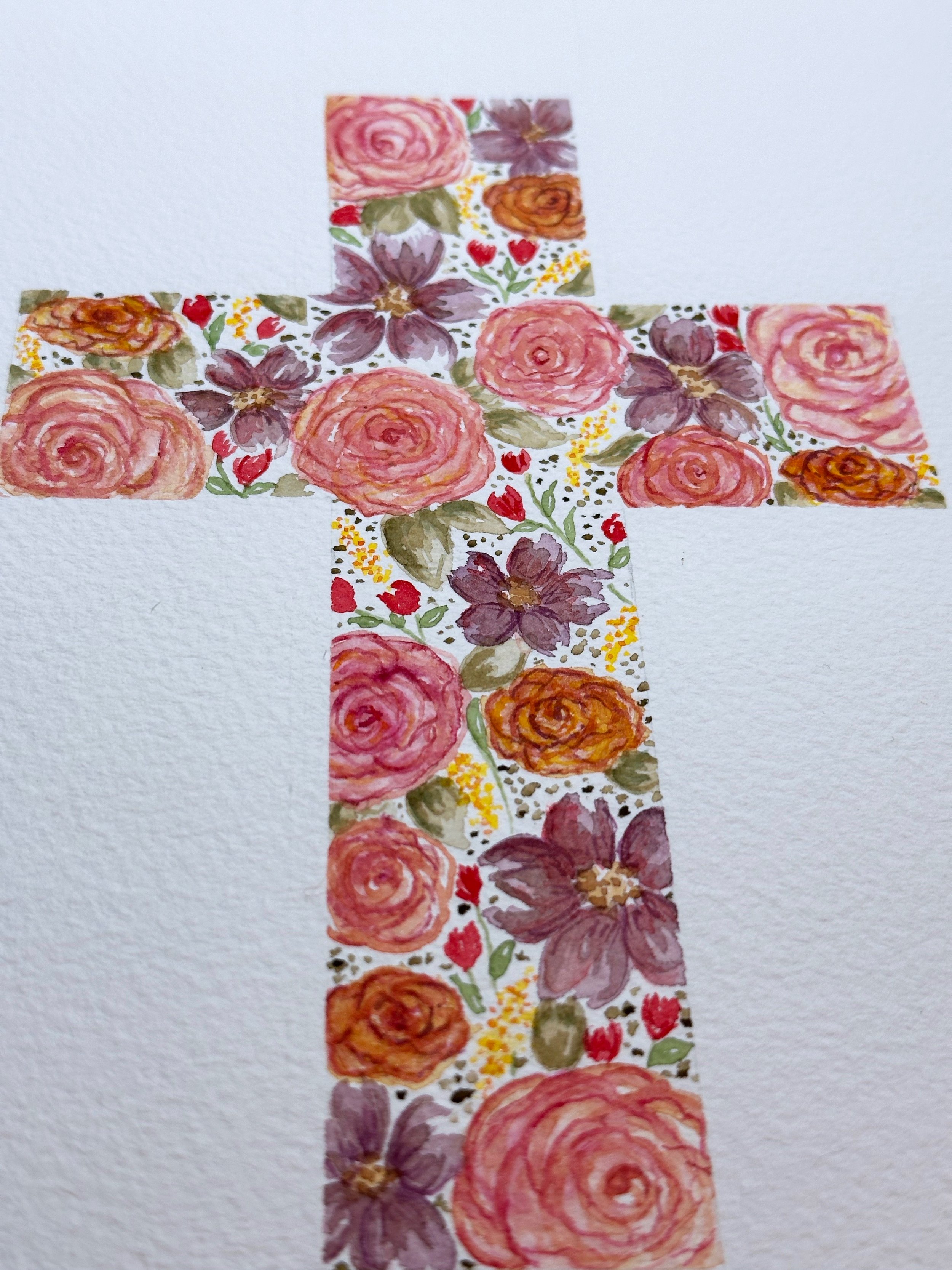 Canvas painting of a cross formed from individual flowers.