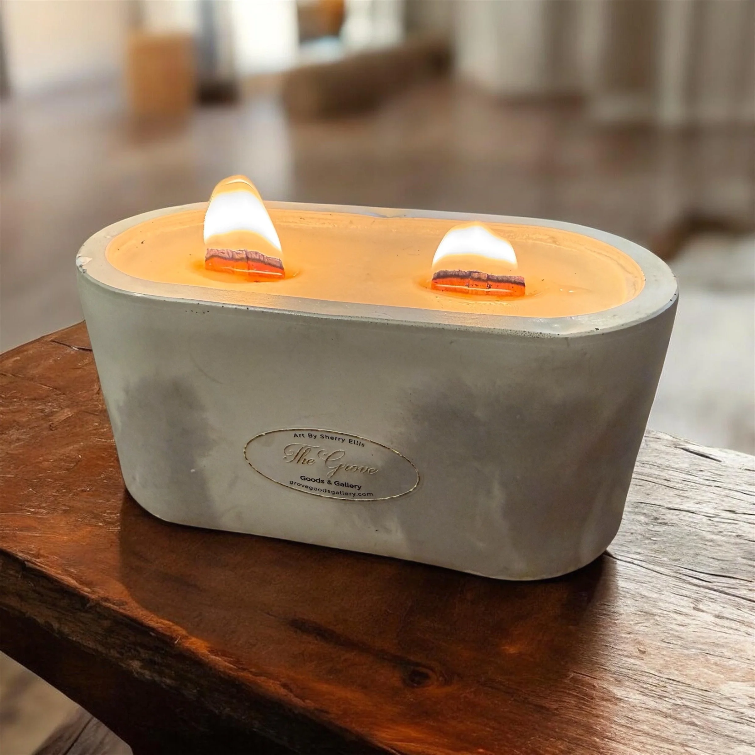 Lit flame soy wax candle with wood wicks