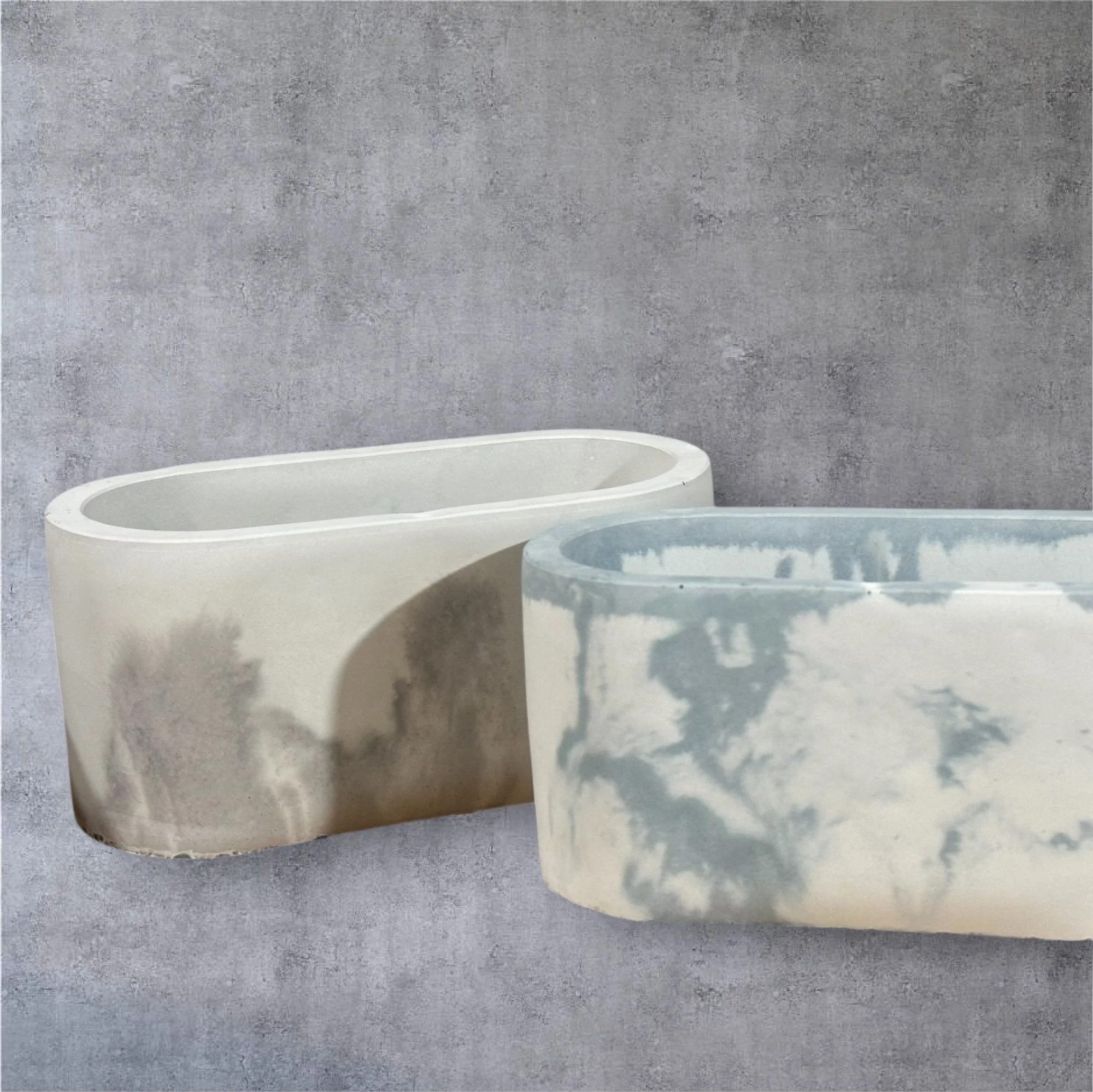 Handcrafted obround candle vessel made from decorative cement