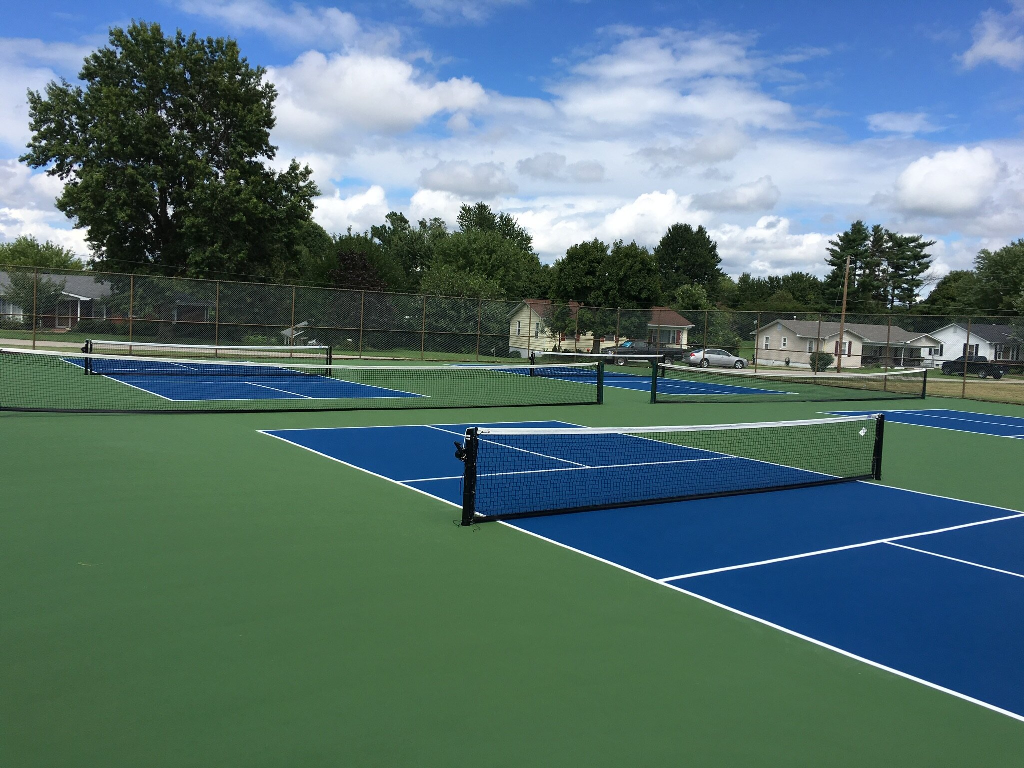 Blue Inside and Green Out-of-bounds (Multiple Pickleball Courts with Tennis Net Divider).jpg