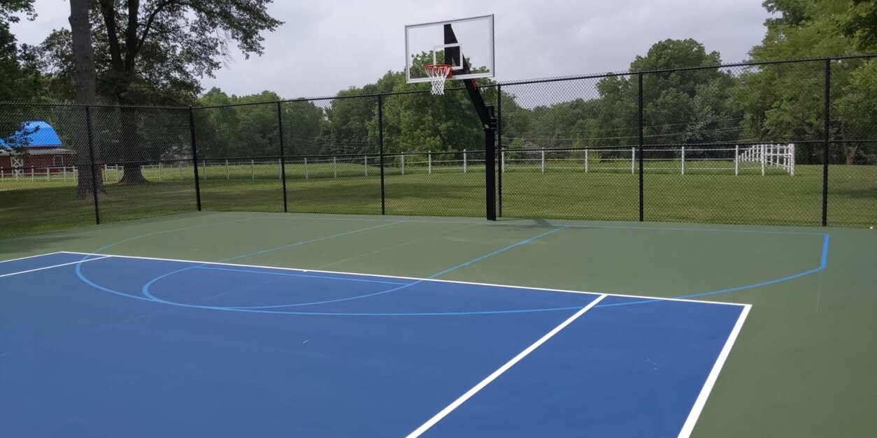 Light Blue Basketball Lines on Tennis Court.jpeg