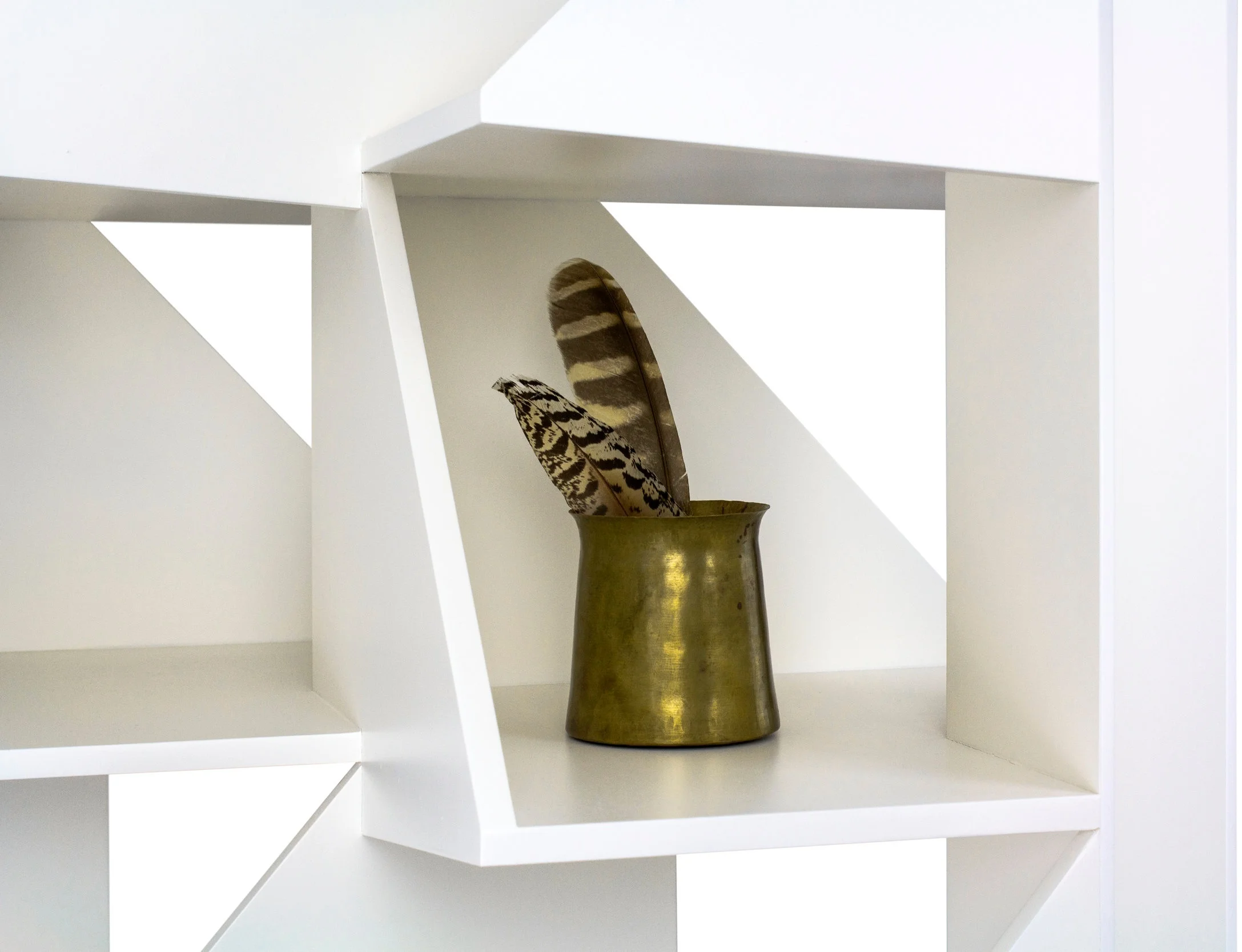 Angular, nested cubbies create displays for books or objects