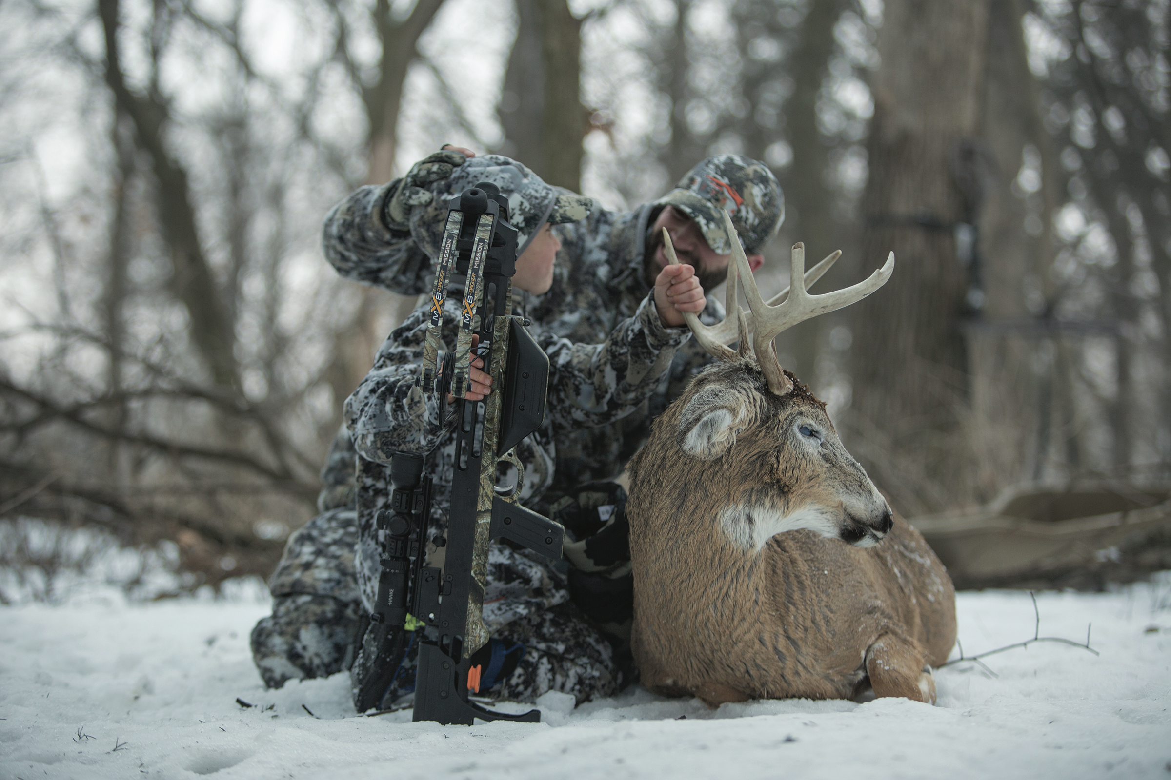 father son with buck.png