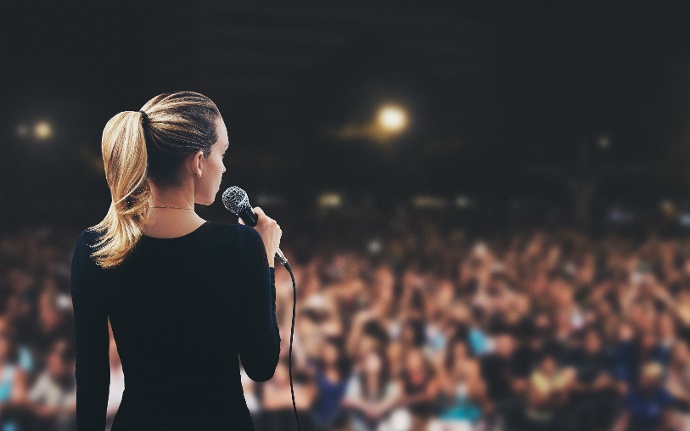 public_speaking_stage_woman.jpeg