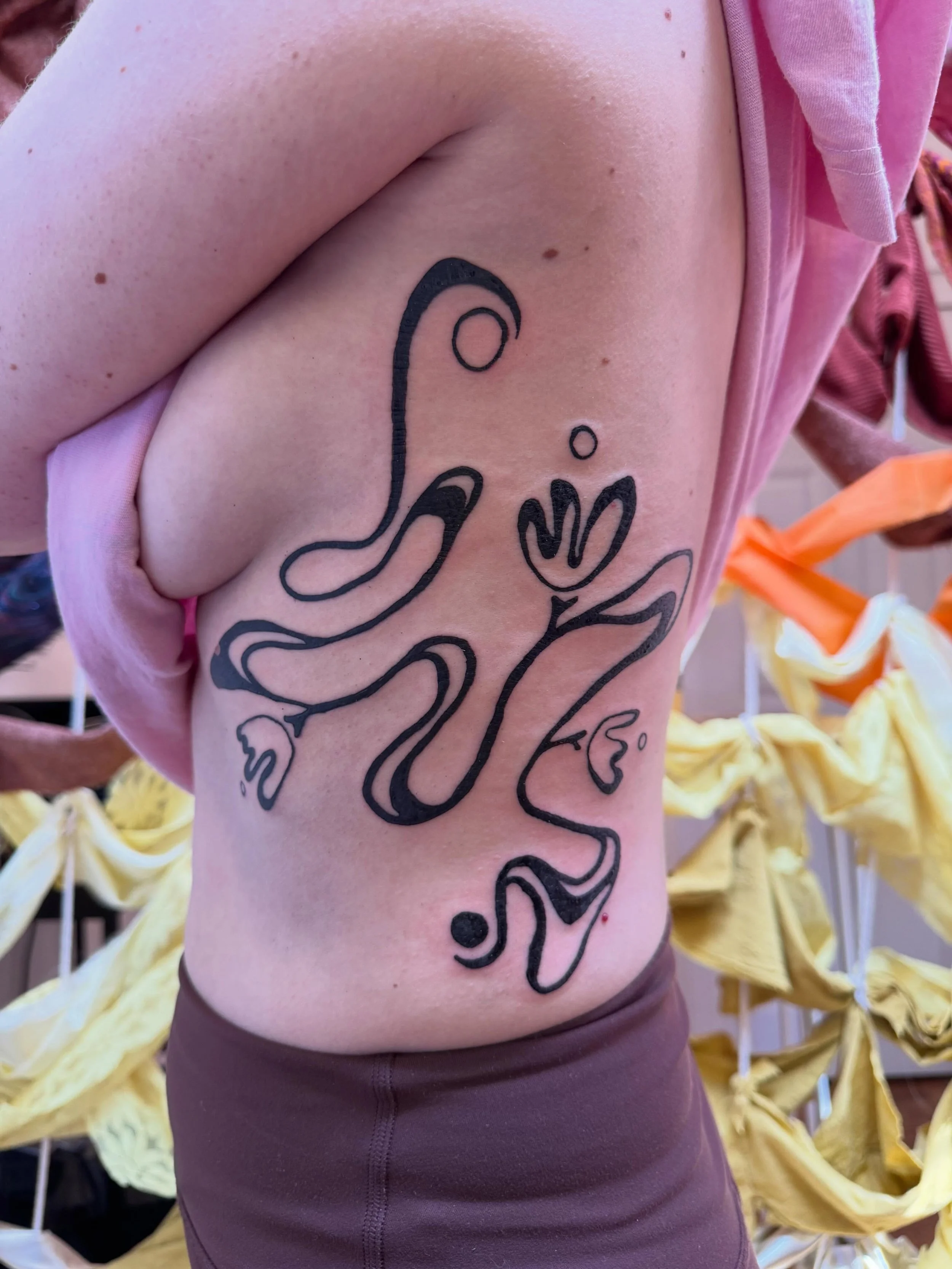 Did someone say dream project 👀🌈✨super wiggly custom rib tat for my girl Caitlyn! I love everything about this piece and would love more projects like it <3 

#bouldertattooartist #denvertattooartist #fortcollinstattooartist #womentattooers #abs