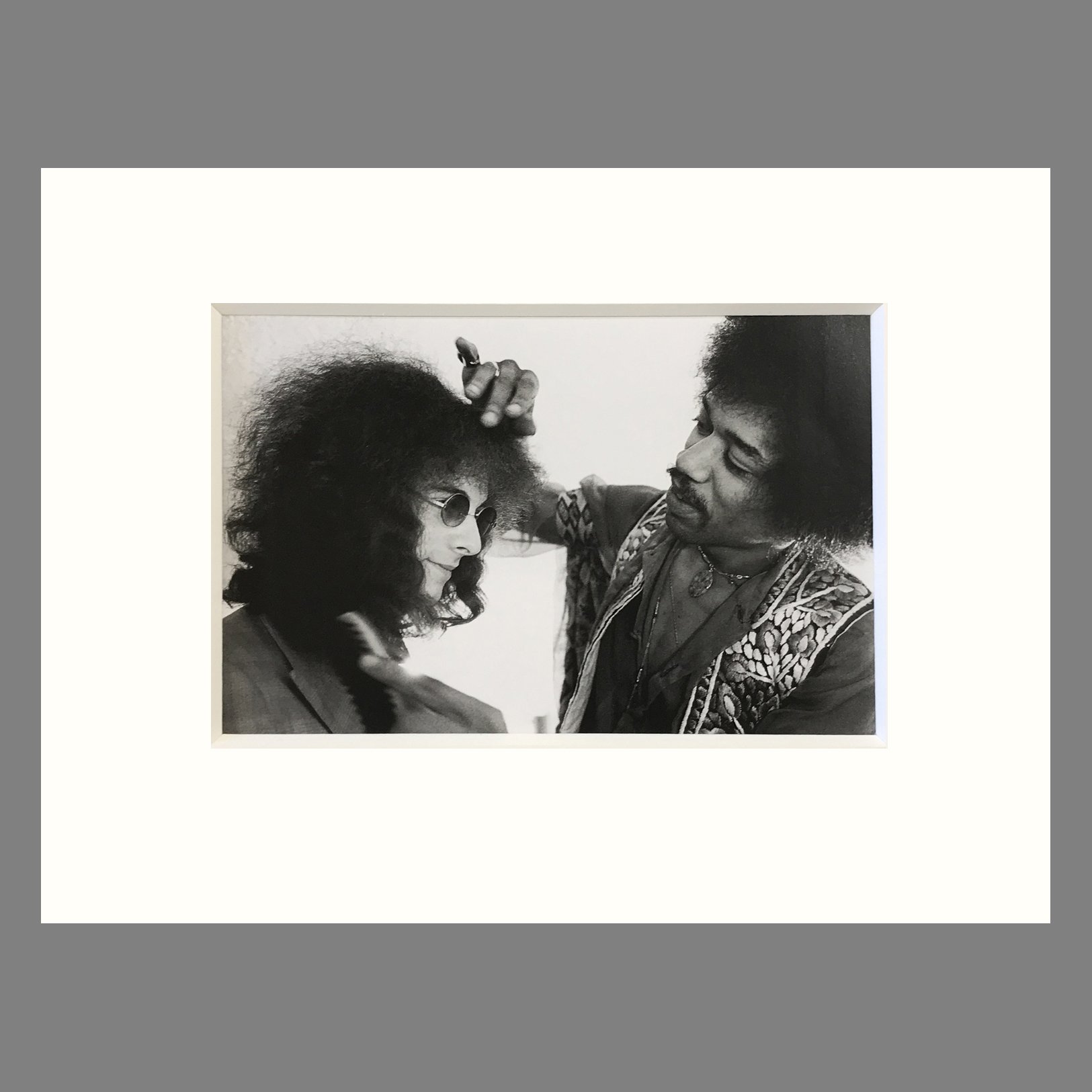 Jimi Hendrix Frizzing Noel Redding's Hair, Winterland, San Francisco - Jim Marshall Photograph - Matted Print 9 x 12