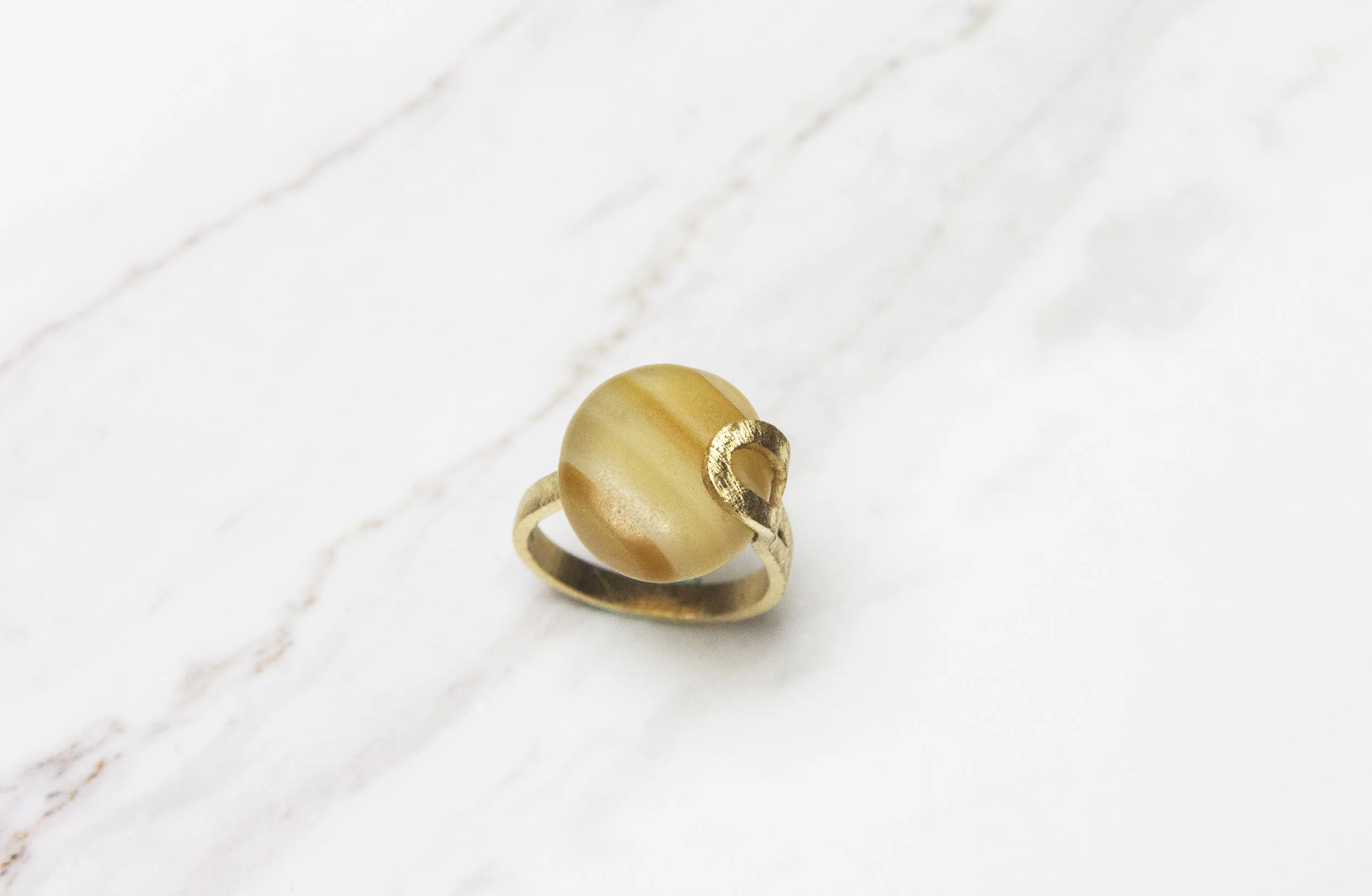 Banded Madagascar agate pebble button ring