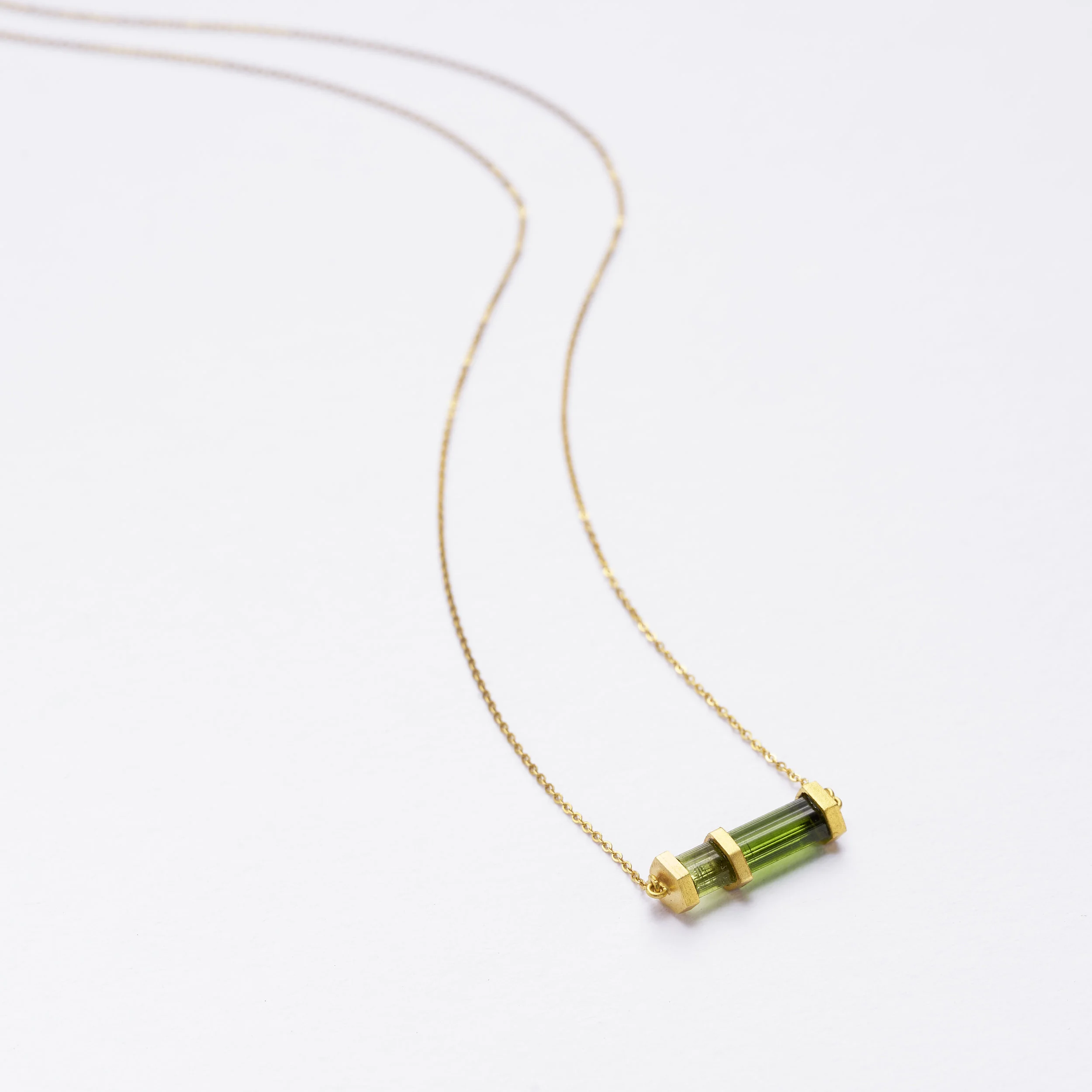 Tourmaline and gold pendant