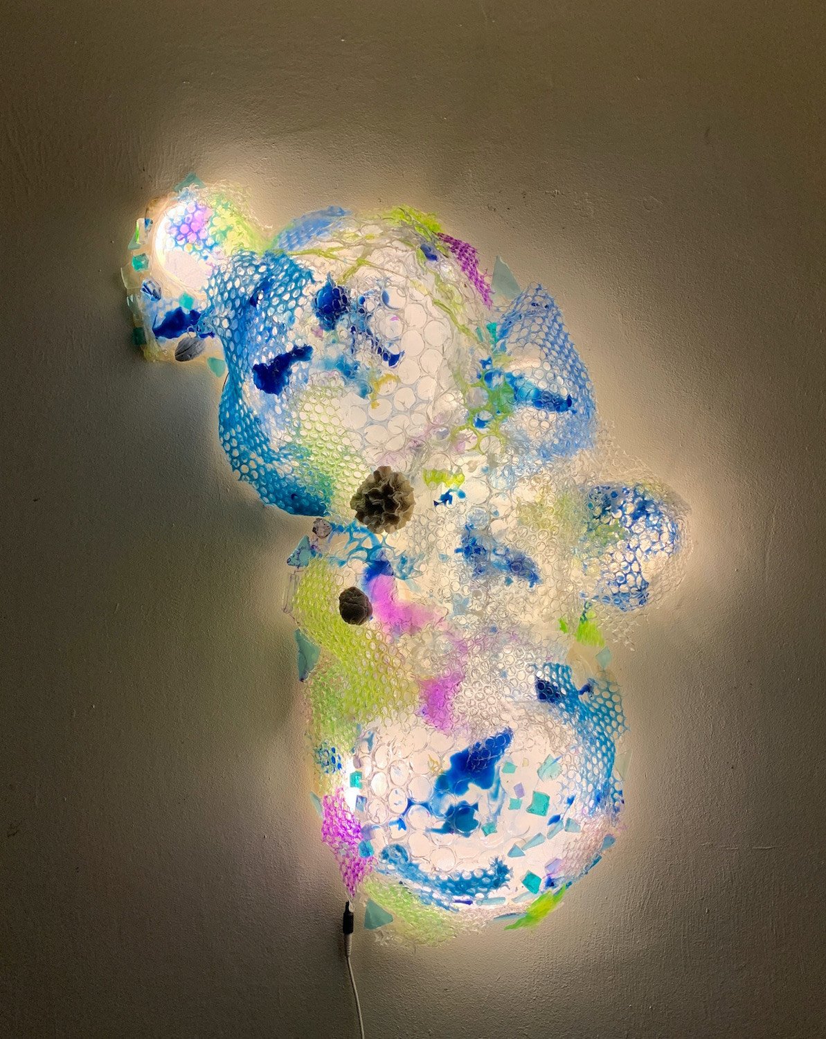   Cassie Doyon ,  Metamorphosis  Mixed media lighted sculpture, 34 x 18 x 5 in.  $2,400  