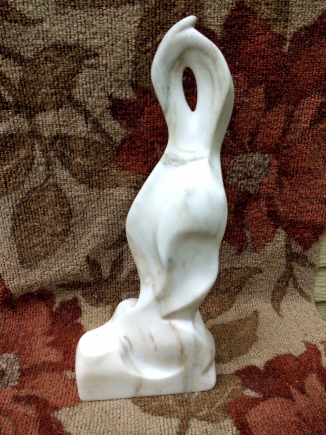   Mark T. Brophy ,  Earth Dance , vermont marble, 24x10x4 1/2 