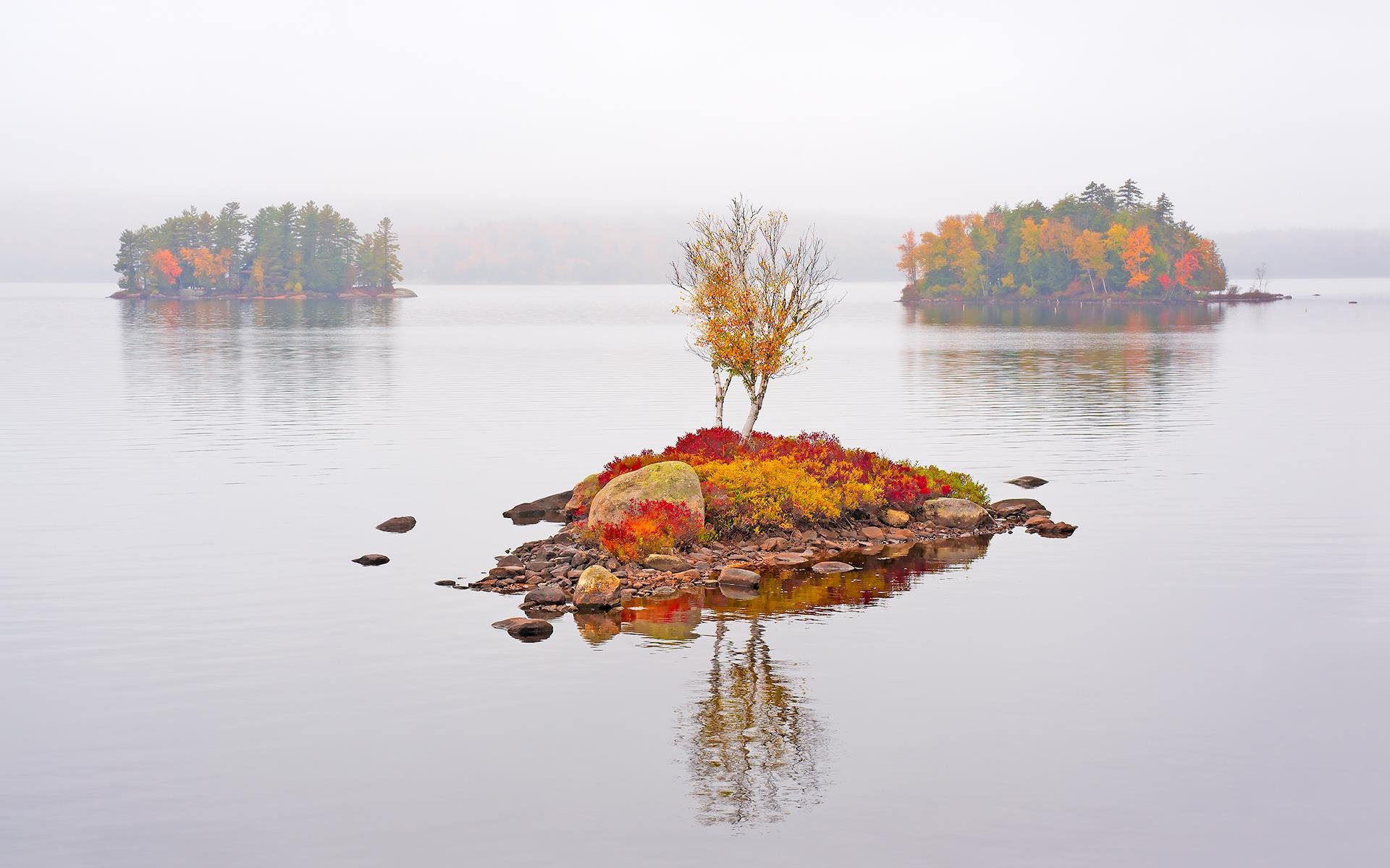   Gary Larsen ,  Fog on Tupper Lake  Color Photograph, 16 × 24 in. $420 