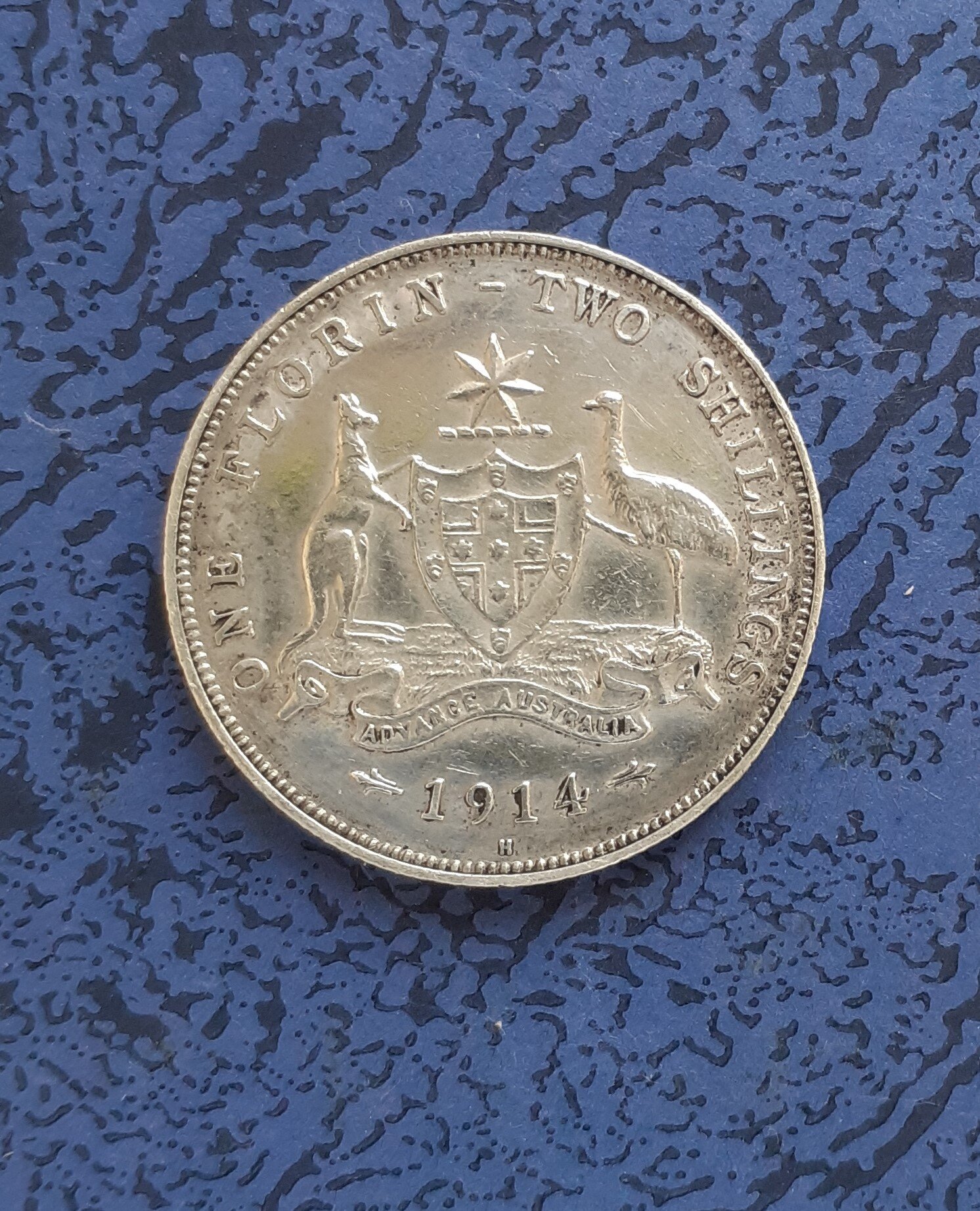 A 1914 H Australian Florin.