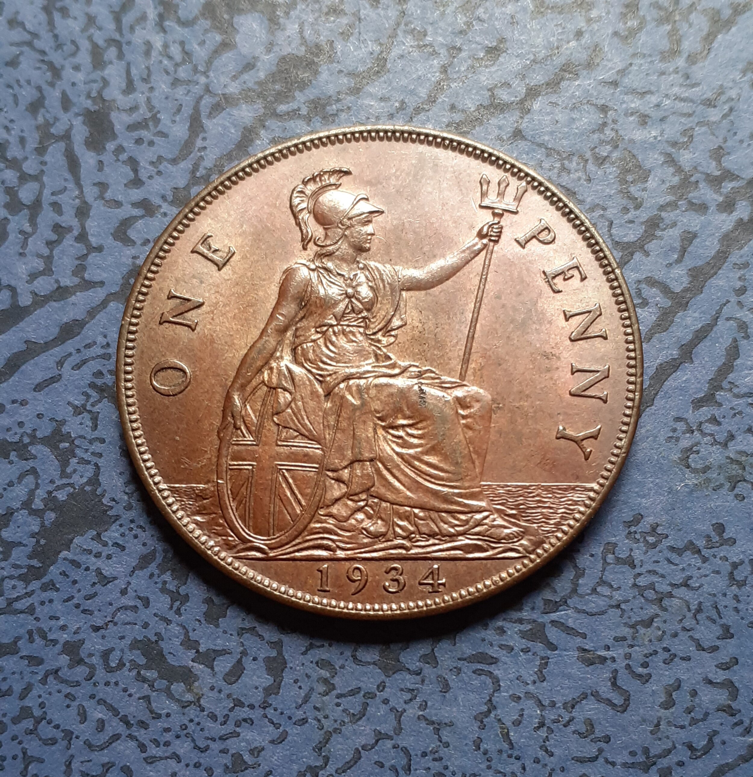 A George V 1934 One Penny Coin.