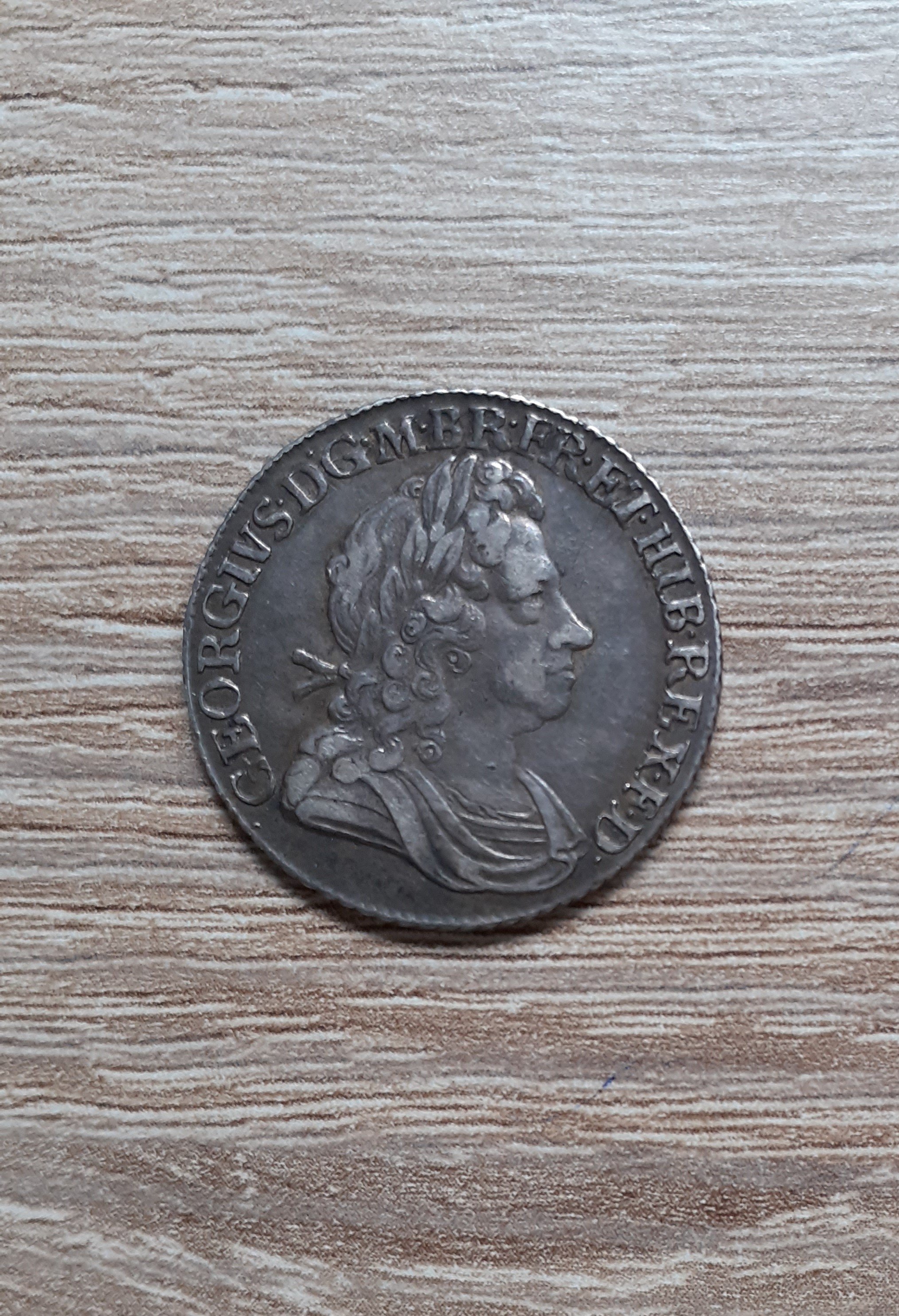 A George I 1723 Silver Shilling.