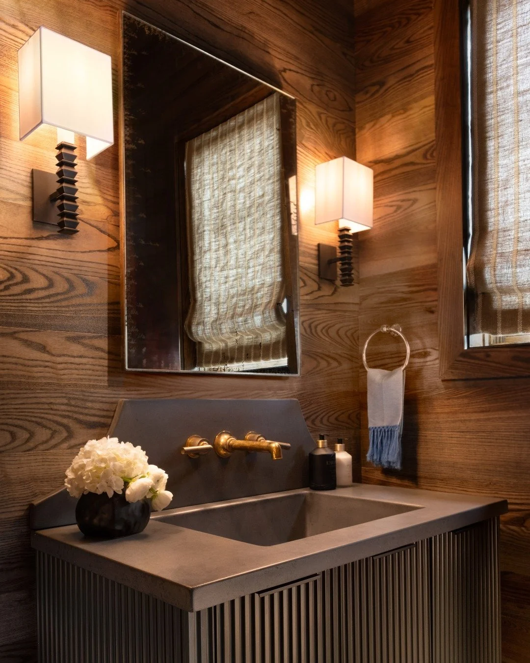 There&rsquo;s a warmth here that comes from the materials themselves&mdash;wood with movement, brass with depth, and finishes that meet without competing.

A space that settles in around you.