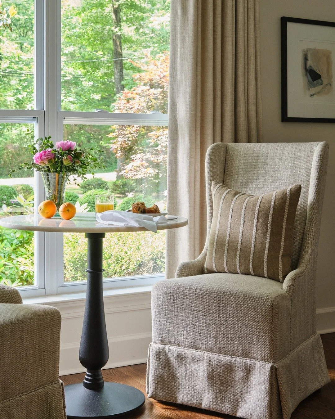 Light moves differently in a room designed for calm.

Soft upholstery, natural light, and quiet tones create a space that feels both welcoming and intentional &mdash; the kind of place where time seems to slow.

A reminder that good design makes room