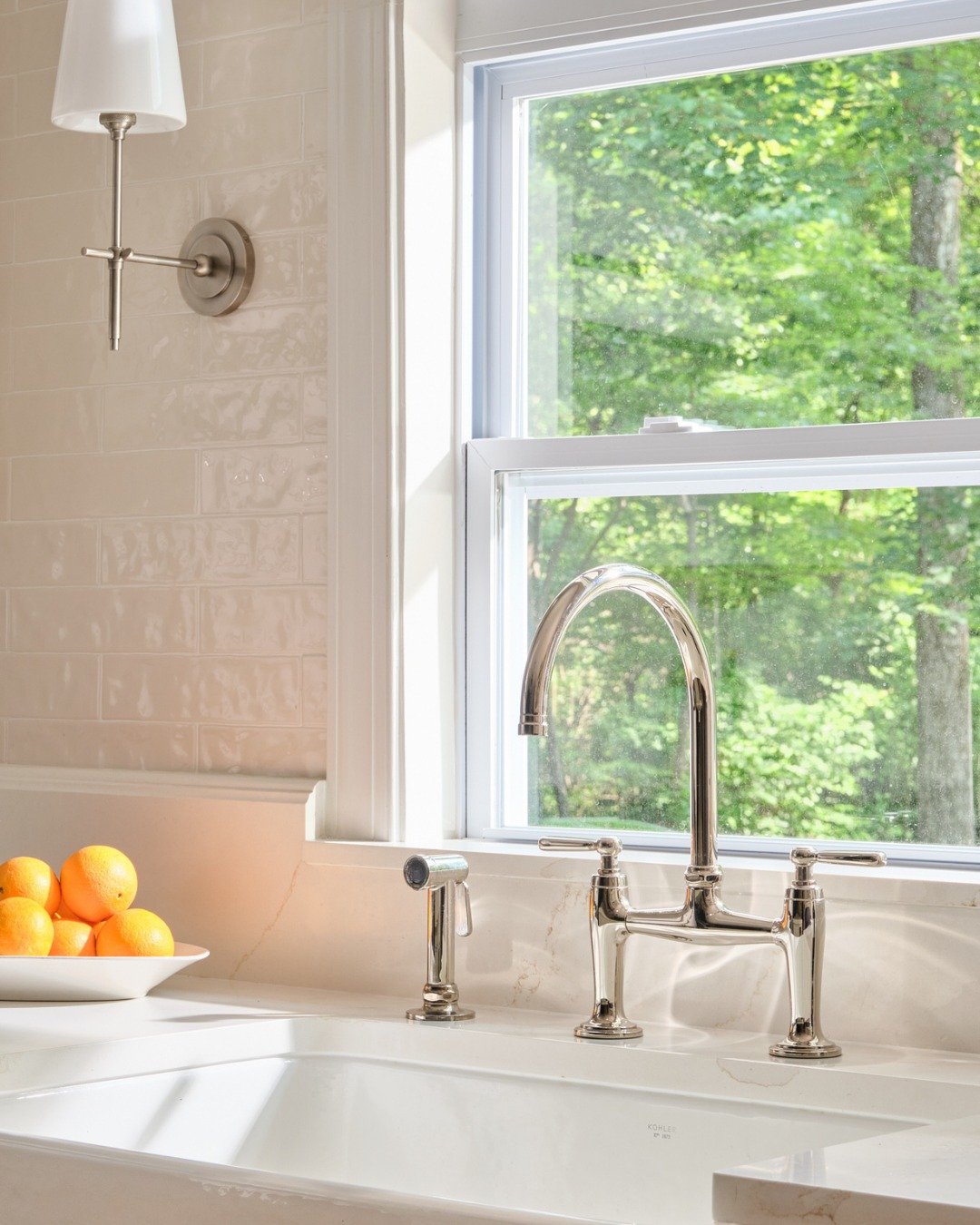 Kitchen details from the Lake Avenue project.

Here, natural light plays a central role &mdash; keeping the space bright and fresh &mdash; while layered textures and thoughtful hardware selections bring warmth and cohesion. It&rsquo;s a balance of cl