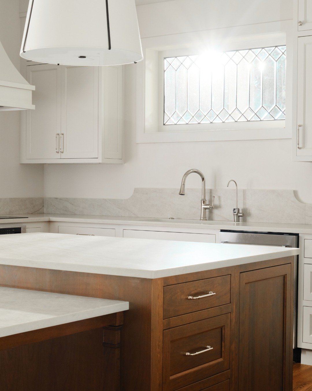 Natural light plays a defining role throughout the Fortwood Historic Renovation, shaping how each space is experienced throughout the day.

Shown here, natural light filters into the Kitchen, Staircase, and Hall &mdash; softening the palette and high