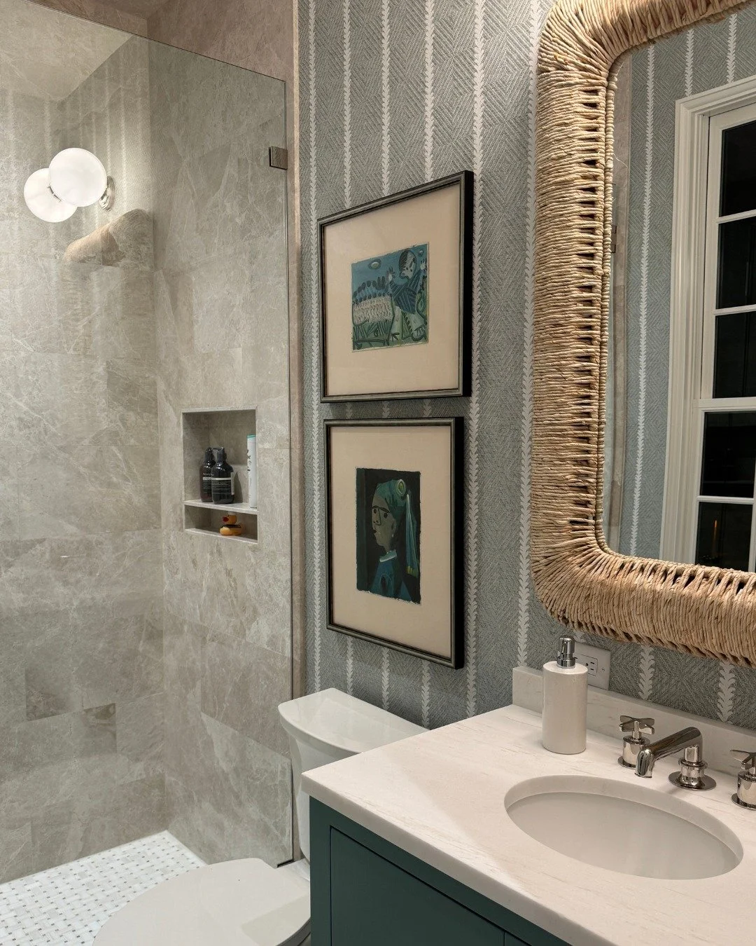 One of our favorite details in this Alys Beach bath &mdash; the wallpaper.

It brings a softness and rhythm to the space during the day, and at night, it takes on a completely different depth under the lighting.

It&rsquo;s a good reminder that bathr