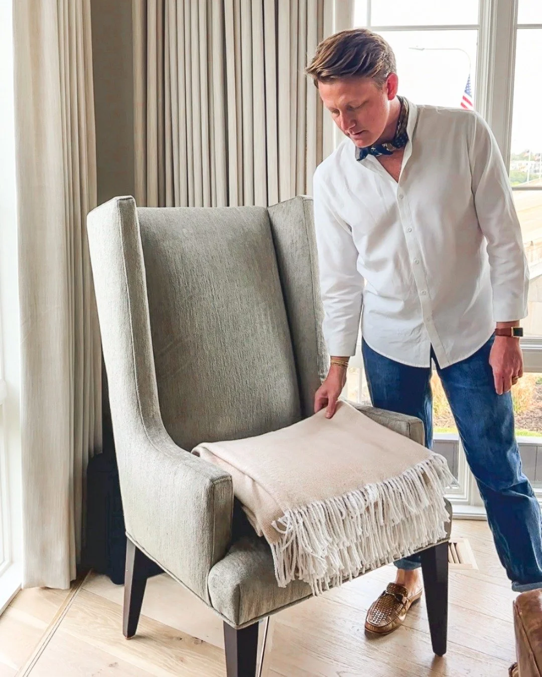 Not everything in your home needs to match for it to feel cohesive.

In fact, it shouldn&rsquo;t.

What matters is connection. Here, we&rsquo;re pulling color from the artwork in the lounge and carrying it into the living room through custom pillows.