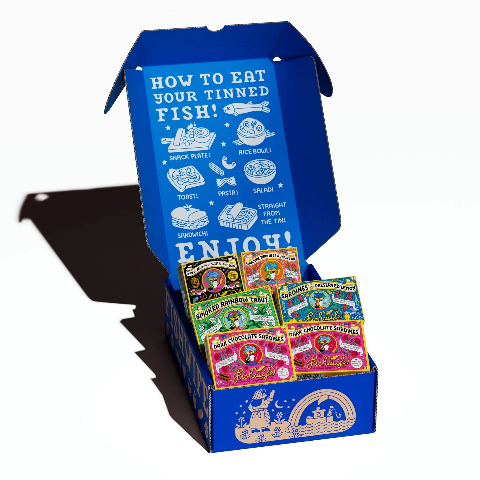 An open Fishwife gift box displays colorful tins of premium tinned seafood, illustrated with playful artwork and serving suggestions inside the lid.
