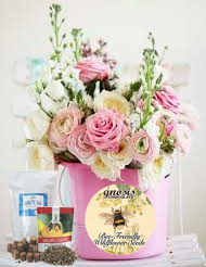 Included with your order while supplies last: packet of wildflower seeds with a pail and soil for the seedlings!