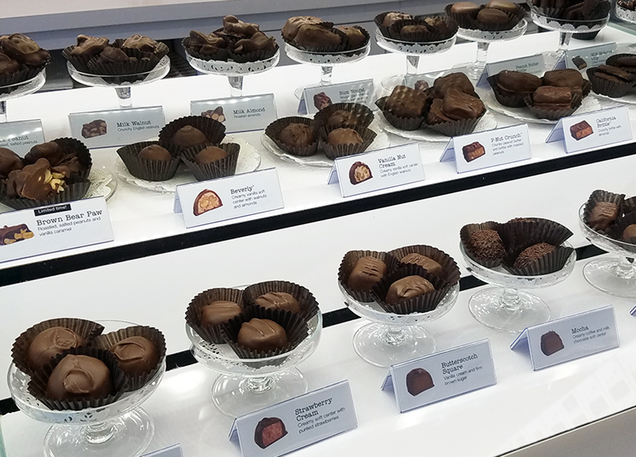  Tray cards at our candy counter show the inside of each delicious piece. 