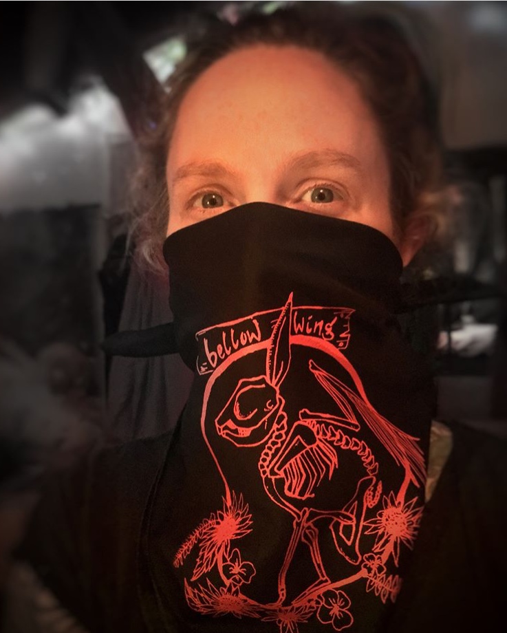 woman wearing Bellow Wing winged rabbit skeleton bandana
