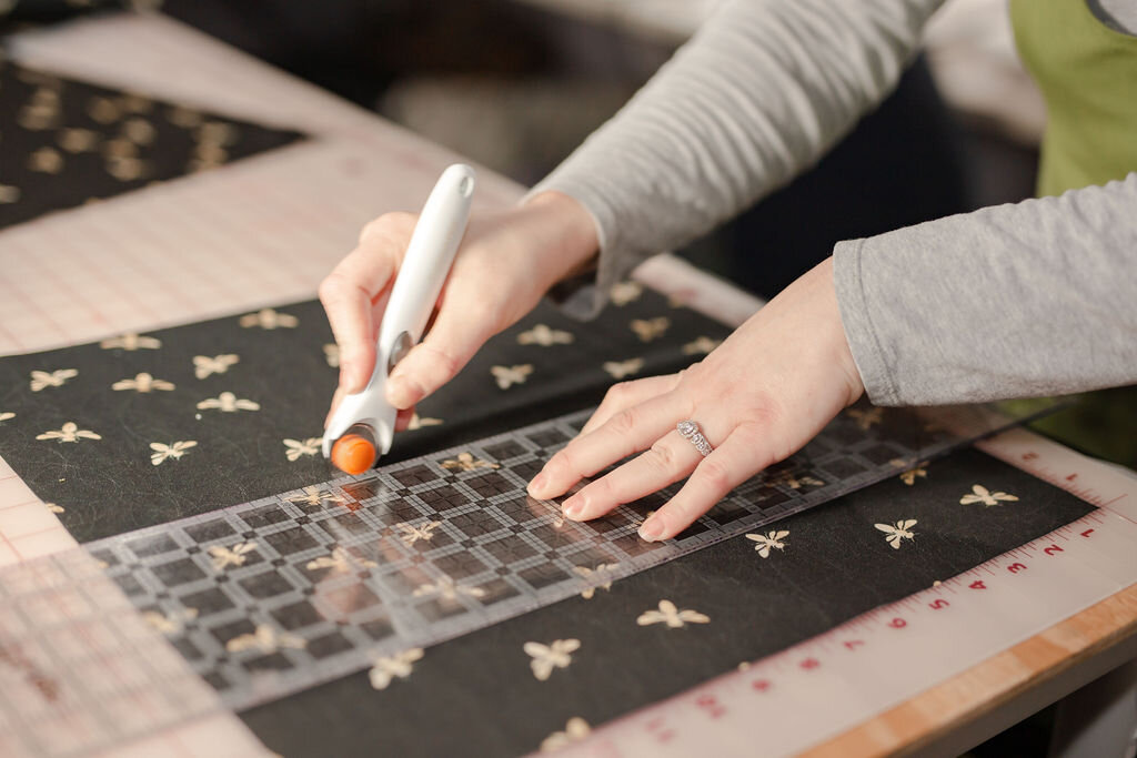 Christina at the cutting table