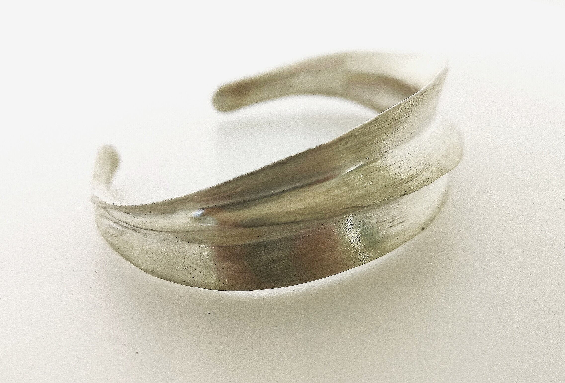 harakeke+Cuff+brushed+finish+angle+view.jpg