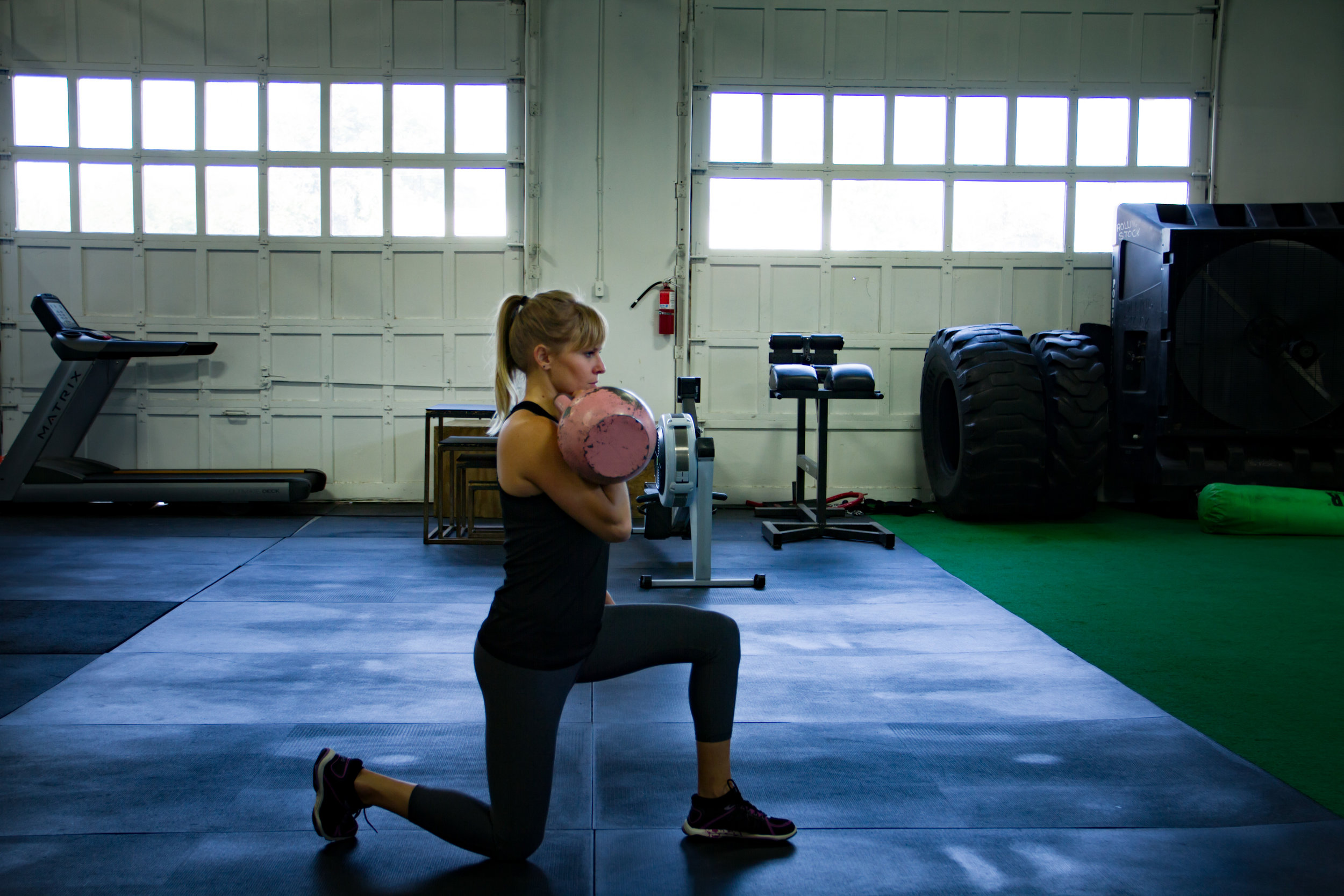 Kate Half Kneeling KB Rack.jpg