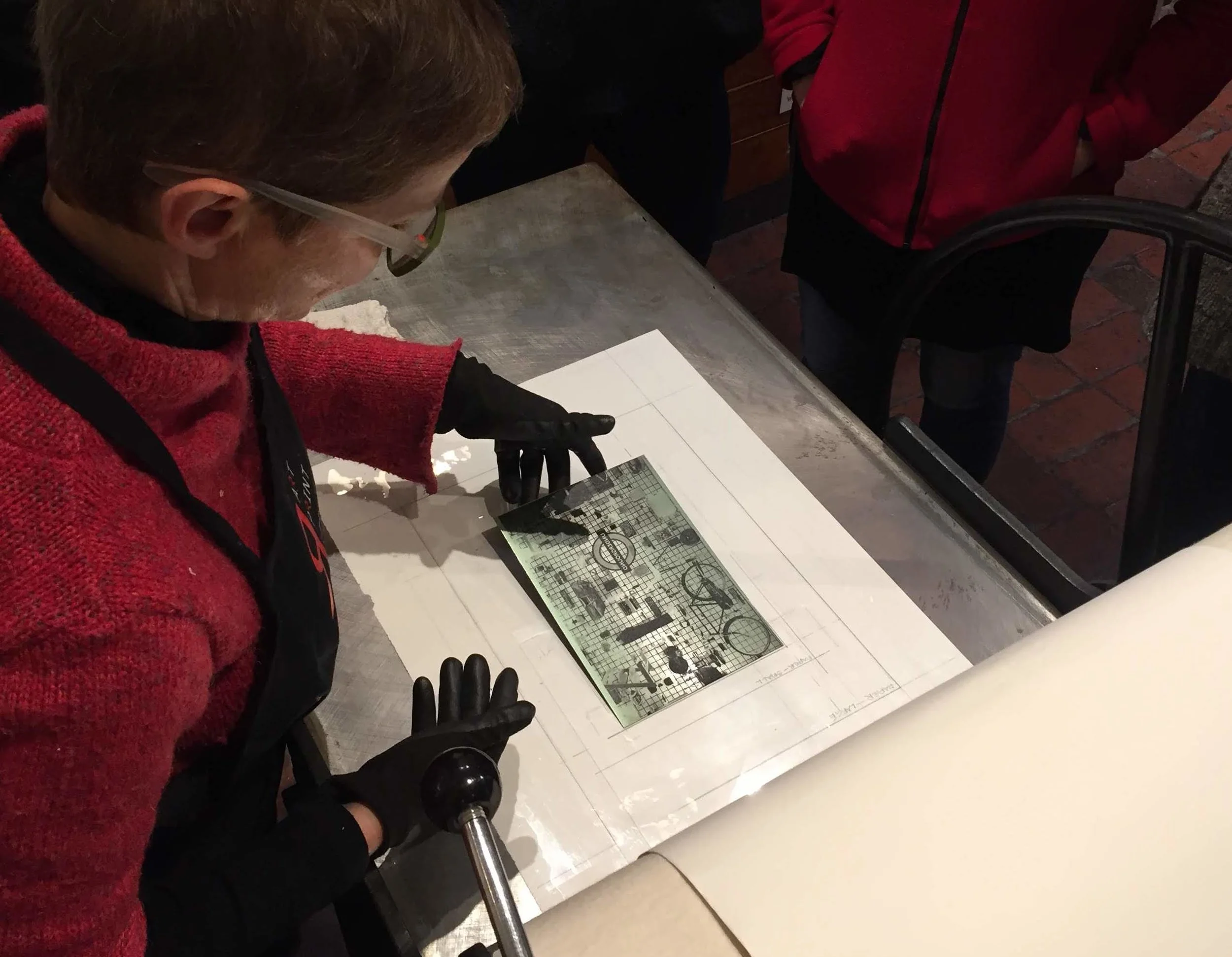 Placing plate on press