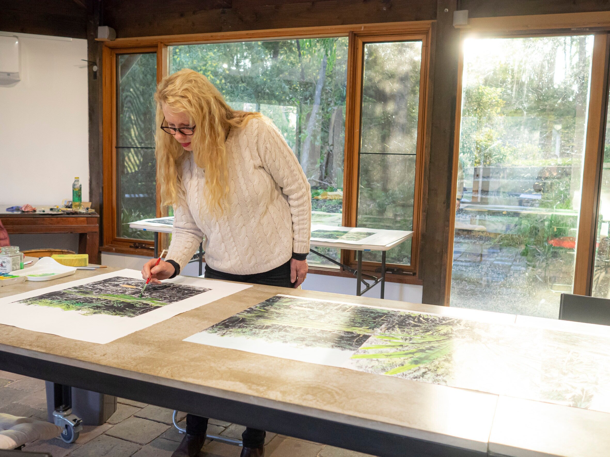 Susan working at Baldessin Studio during her 2020 residency.