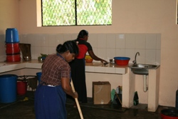 Clearing the new kitchen after the food has been cooked