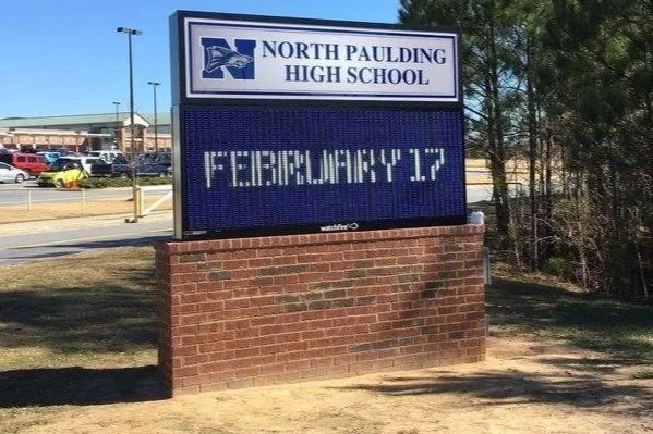 School sign for North Paulding High School with a digital display showing the date February 17.