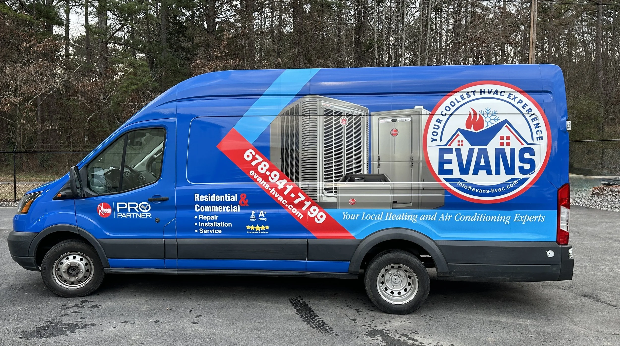 Blue HVAC service van featuring Evans logo and contact information, with images of HVAC units and text indicating heating and air conditioning services.