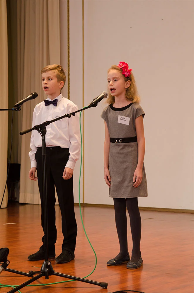 (9–11) Maxim and Marina Timofeev sang "In the Forest near the Fringe" They harmonized beautifully.