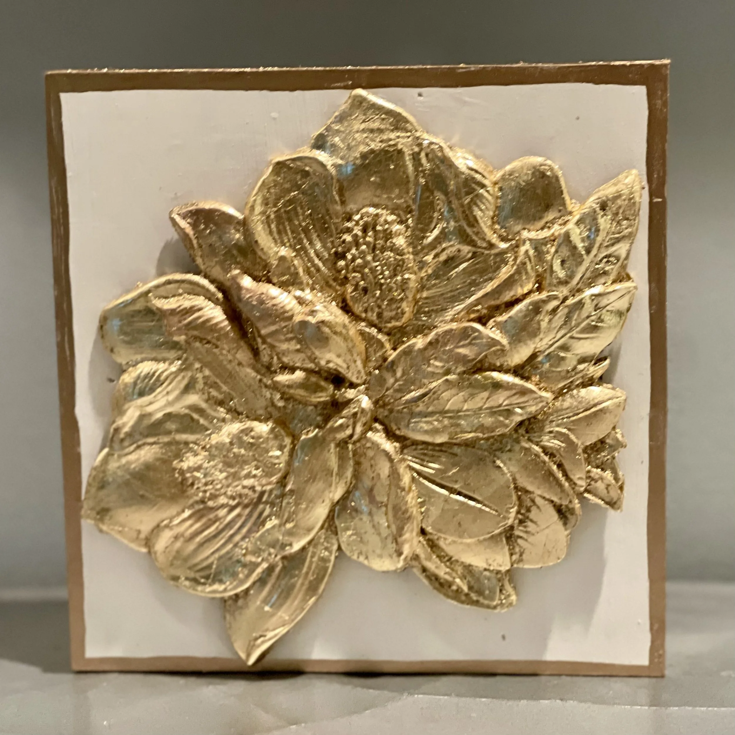 Magnolia Blooms on Wood