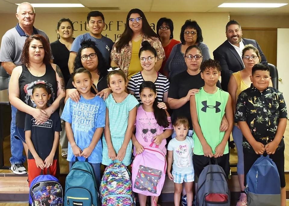 2nd Annual Build-a-Backpack Student Recipients , Mayor Ricky White, and City Hall staff