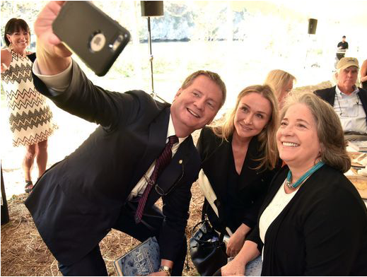 Knox County Mayor Tim Burchett, left, takes a selfie with Alexandra Cousteau, center, and Knoxville Mayor Madeline Rogero at the Legacy Parks' annual luncheon at the Seven Islands State Birding Park on Friday, Oct. 13, 2017. Alexandra Cousteau, award-winning filmmaker, National Geographic Explorer and global water advocate, was the featured speaker at the event. (Photo: J. Miles Cary / Special to the News Sentinel)