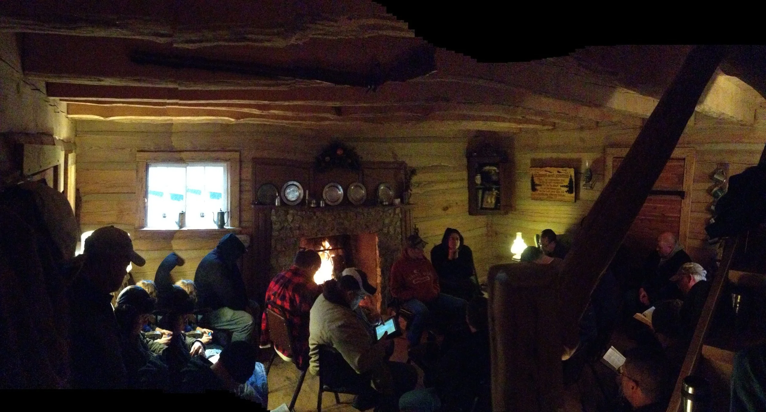 G Bible study in cabin more.JPG