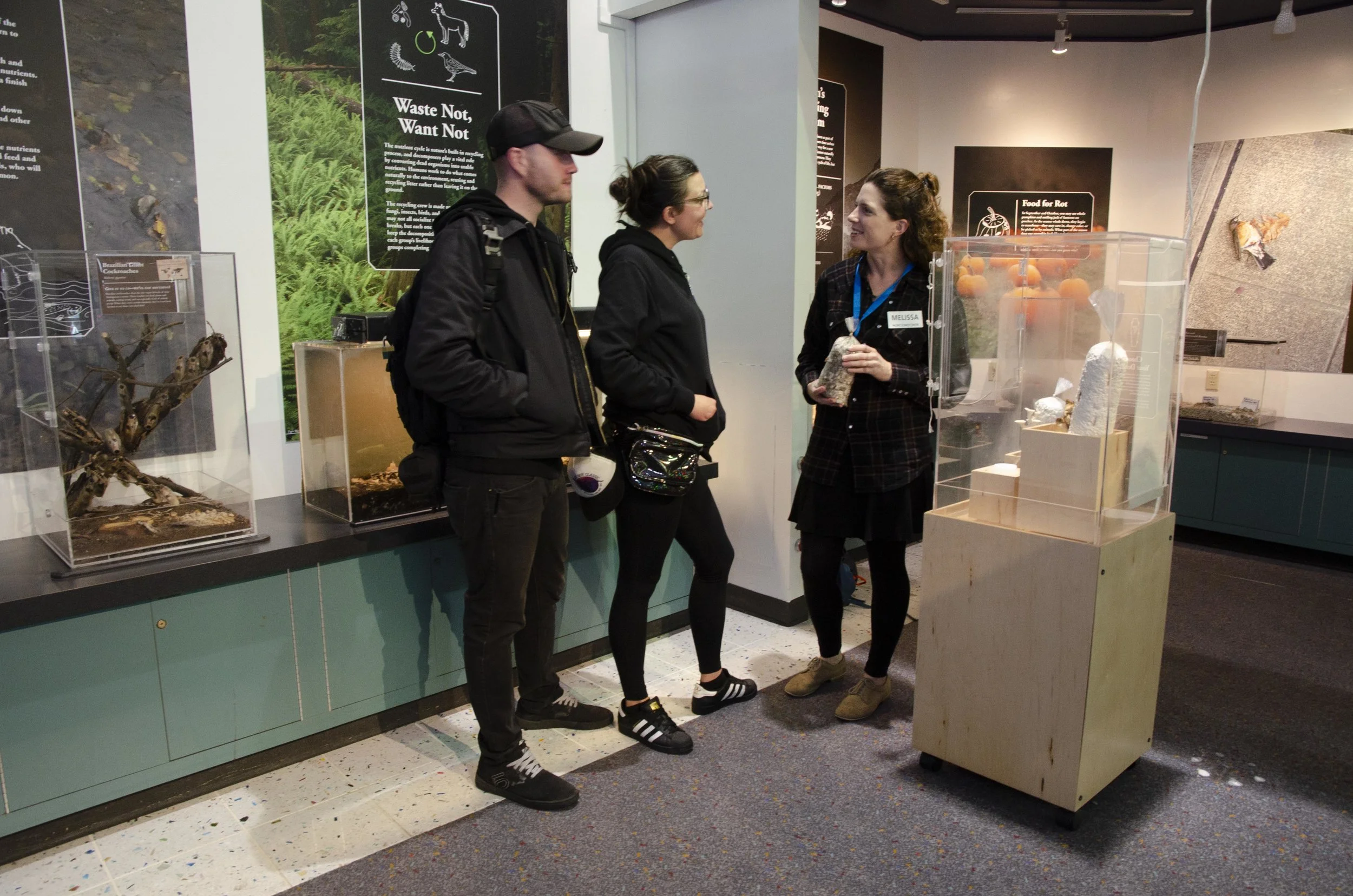 Chatting with guests about mushrooms and the Death is not the End Exhibit. Mushrooms unite us all.