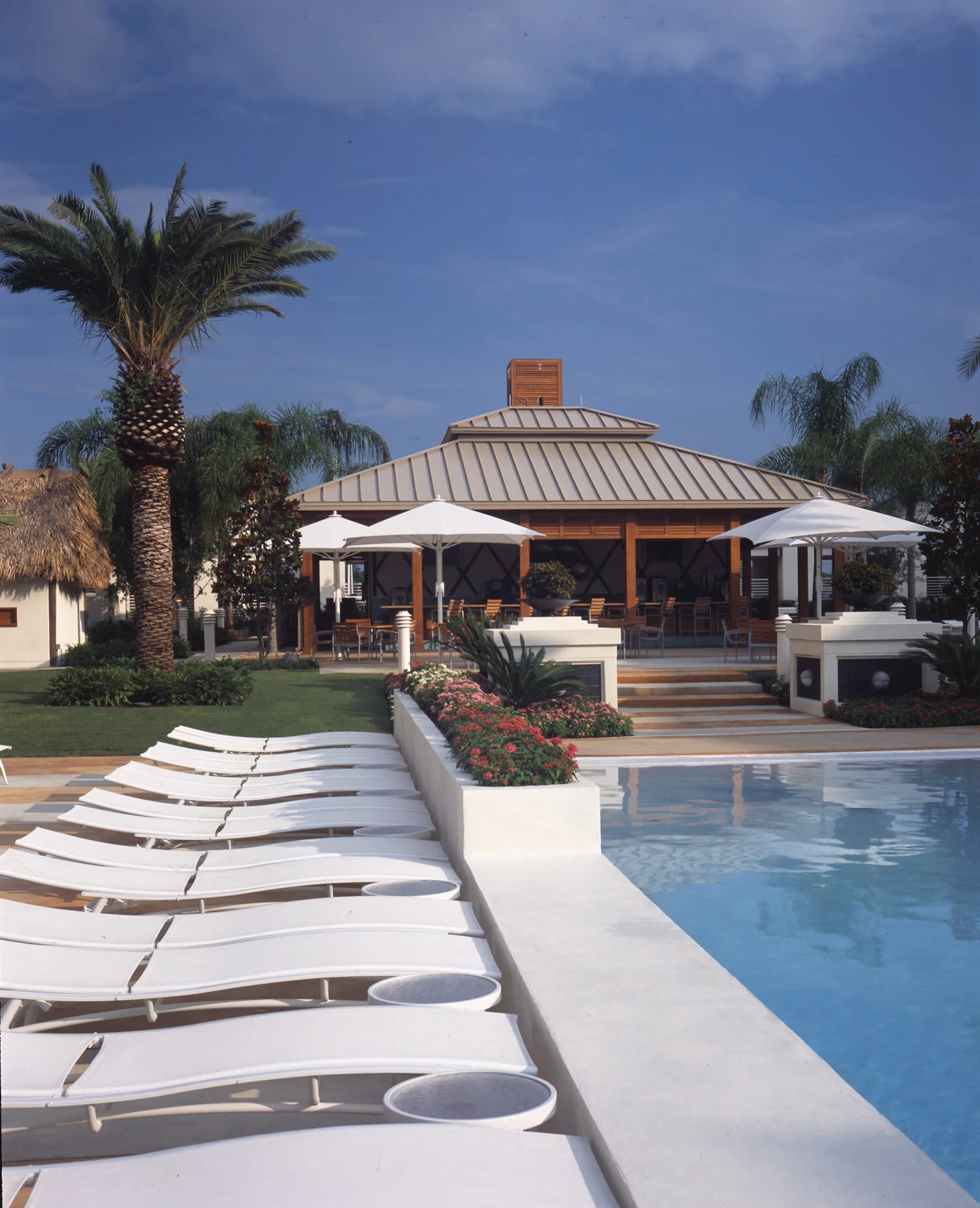 in pool lounge chairs on Hard Rock Hotel Casino Tampa Ralph Gentile Architects