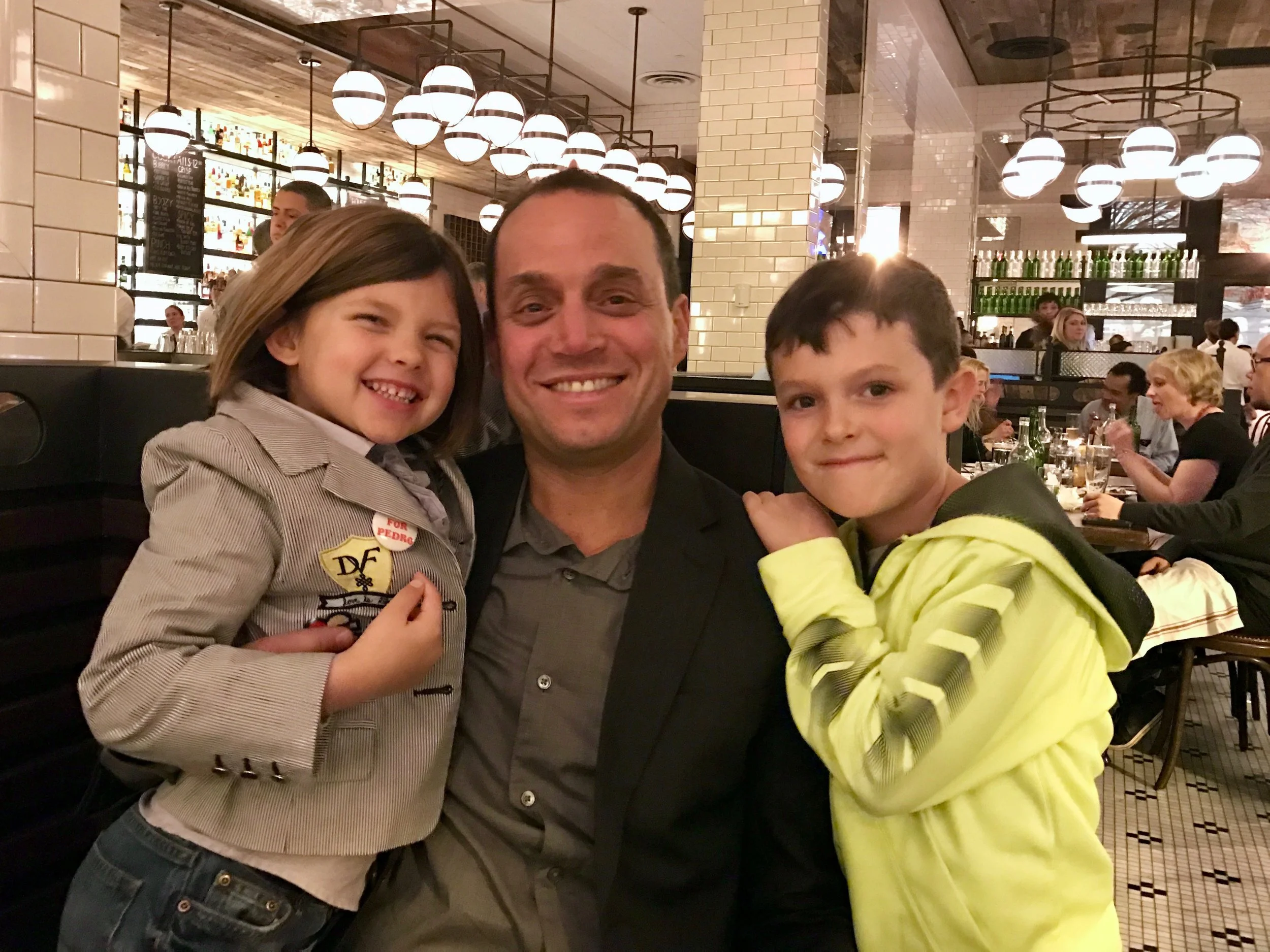 Jeff Lefcourt, co-owner of The Smith , with two of his three kiddos in his New York City restaurant.