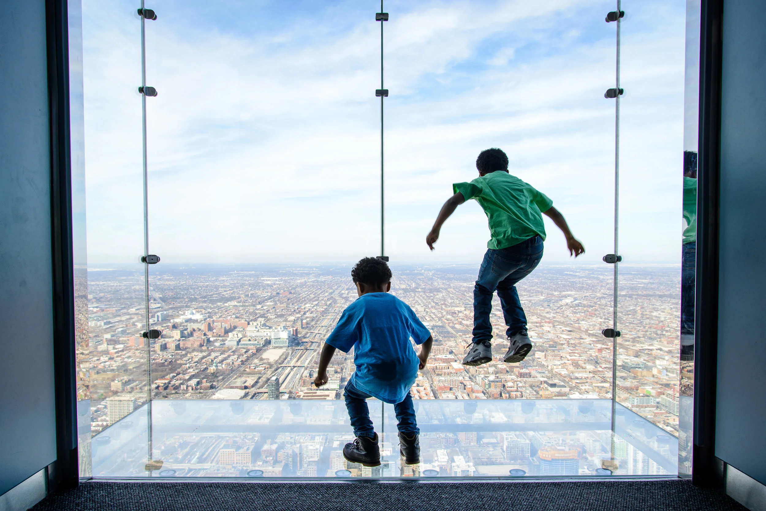 The glass balconies at the Skydeck , overlooking downtown Chicago. 