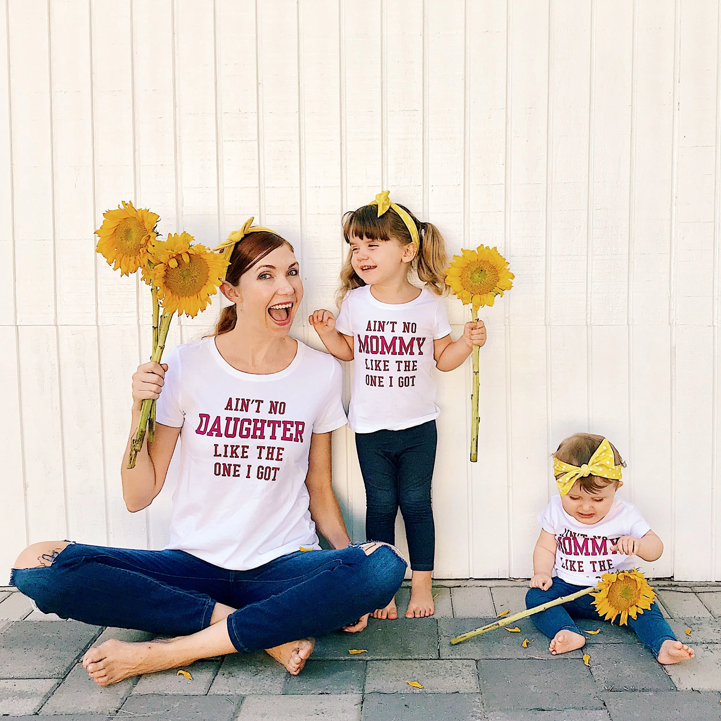 Use props: “Find fun flowers to hold or something that gets their attention,” says Maxhimer.